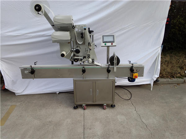 Botila laua jartzeko makina automatikoa duen planoa etiketatzeko makina 