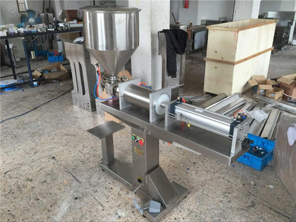 Buru bakarreko ezti betetzeko makina erdi automatikoa